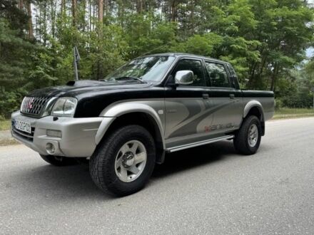 Міцубісі Л 200 2001 у Краматорске на Automoto.ua Чорний Міцубісі Л 200, об'ємом двигуна 2.5 л та пробігом 258 тис. км за 2450 $, фото 1 на Automoto.ua