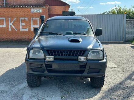 Мицубиси Л 200 2001 в Черкассах на Automoto.ua Черный Мицубиси Л 200, объемом двигателя 2.5 л и пробегом 250 тыс. км за 4800 $, фото 1 на Automoto.ua