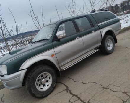 Черный Мицубиси Л 200, объемом двигателя 2.5 л и пробегом 120 тыс. км за 5500 $, фото 1 на Automoto.ua