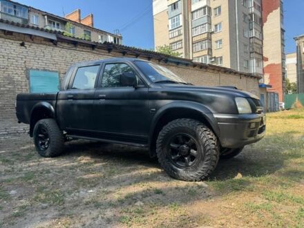Міцубісі Л 200 2002 у Славянске на Automoto.ua Чорний Міцубісі Л 200, об'ємом двигуна 0 л та пробігом 200 тис. км за 3600 $, фото 1 на Automoto.ua