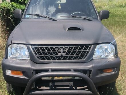 Чорний Міцубісі Л 200, об'ємом двигуна 0 л та пробігом 530 тис. км за 4100 $, фото 1 на Automoto.ua