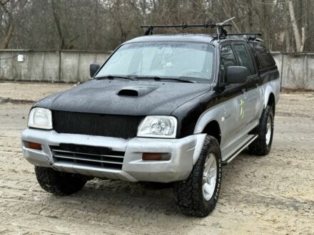 Чорний Міцубісі Л 200, об'ємом двигуна 2.5 л та пробігом 355 тис. км за 4500 $, фото 1 на Automoto.ua