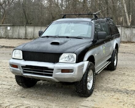 Чорний Міцубісі Л 200, об'ємом двигуна 2.5 л та пробігом 355 тис. км за 4500 $, фото 1 на Automoto.ua