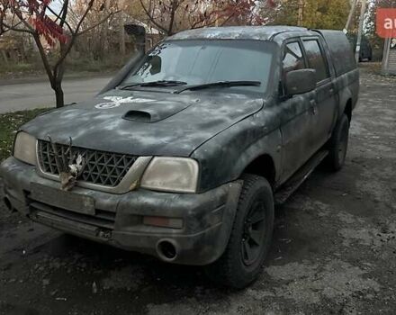 Черный Мицубиси Л 200, объемом двигателя 0 л и пробегом 300 тыс. км за 5000 $, фото 1 на Automoto.ua