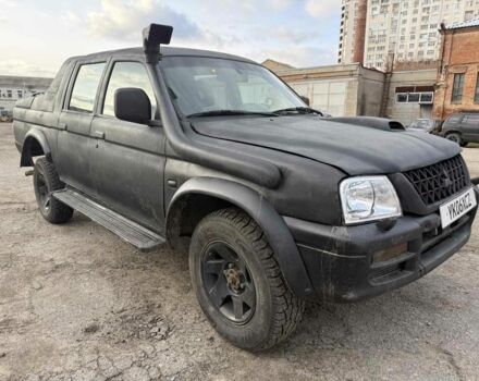 Черный Мицубиси Л 200, объемом двигателя 3.2 л и пробегом 280 тыс. км за 3000 $, фото 1 на Automoto.ua