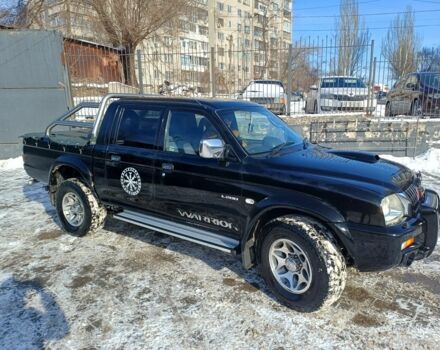 Черный Мицубиси Л 200, объемом двигателя 0 л и пробегом 217 тыс. км за 5300 $, фото 1 на Automoto.ua