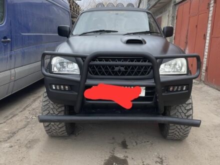 Черный Мицубиси Л 200, объемом двигателя 2.5 л и пробегом 190 тыс. км за 7000 $, фото 1 на Automoto.ua