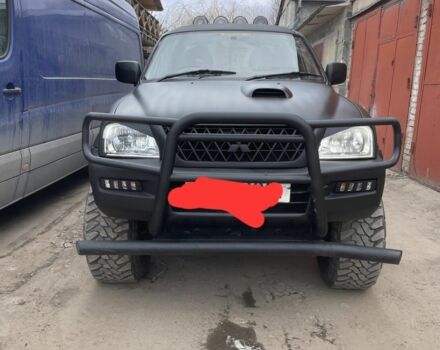 Черный Мицубиси Л 200, объемом двигателя 2.5 л и пробегом 190 тыс. км за 7000 $, фото 1 на Automoto.ua