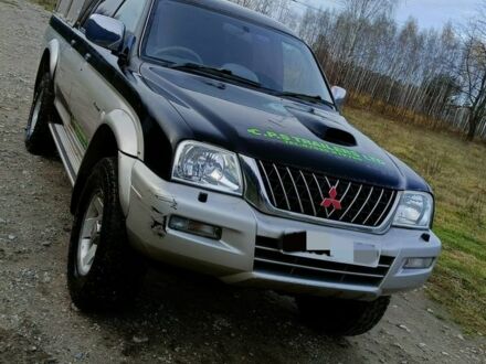 Чорний Міцубісі Л 200, об'ємом двигуна 2.5 л та пробігом 160 тис. км за 5600 $, фото 1 на Automoto.ua