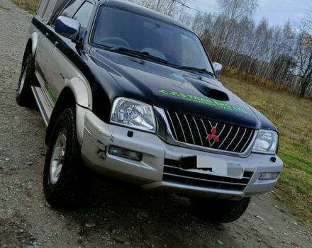 Чорний Міцубісі Л 200, об'ємом двигуна 2.5 л та пробігом 160 тис. км за 5600 $, фото 1 на Automoto.ua