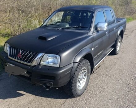 Чорний Міцубісі Л 200, об'ємом двигуна 2.5 л та пробігом 250 тис. км за 4000 $, фото 1 на Automoto.ua