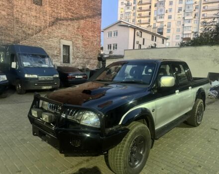 Чорний Міцубісі Л 200, об'ємом двигуна 2.5 л та пробігом 213 тис. км за 4700 $, фото 1 на Automoto.ua