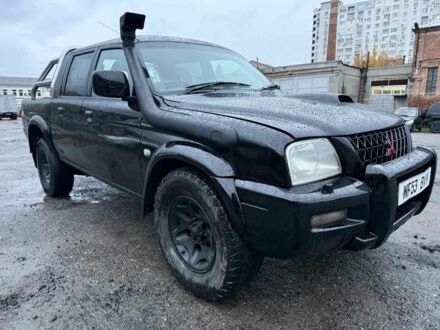 Мицубиси Л 200 2004 в Харькове на Automoto.ua Черный Мицубиси Л 200, объемом двигателя 2.5 л и пробегом 218 тыс. км за 4000 $, фото 1 на Automoto.ua
