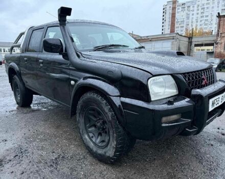 Чорний Міцубісі Л 200, об'ємом двигуна 2.5 л та пробігом 218 тис. км за 4000 $, фото 1 на Automoto.ua