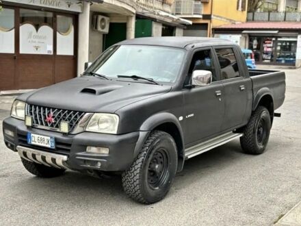 Міцубісі Л 200 2004 у Харкові на Automoto.ua Чорний Міцубісі Л 200, об'ємом двигуна 2.5 л та пробігом 205 тис. км за 2900 $, фото 1 на Automoto.ua