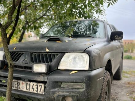 Мицубиси Л 200 2004 в Харькове на Automoto.ua Черный Мицубиси Л 200, объемом двигателя 2.5 л и пробегом 3 тыс. км за 3700 $, фото 1 на Automoto.ua