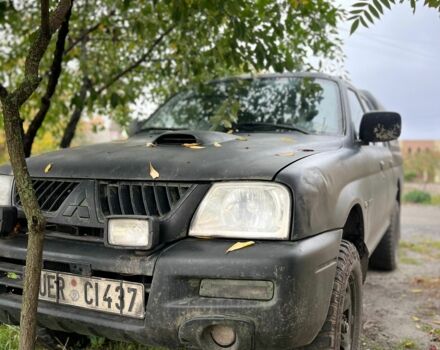 Чорний Міцубісі Л 200, об'ємом двигуна 2.5 л та пробігом 3 тис. км за 3700 $, фото 1 на Automoto.ua