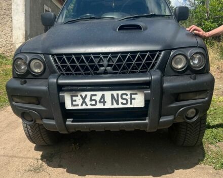 Чорний Міцубісі Л 200, об'ємом двигуна 2.5 л та пробігом 250 тис. км за 4500 $, фото 1 на Automoto.ua