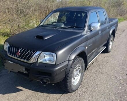 Чорний Міцубісі Л 200, об'ємом двигуна 2.5 л та пробігом 200 тис. км за 5100 $, фото 1 на Automoto.ua