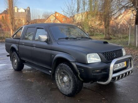 Чорний Міцубісі Л 200, об'ємом двигуна 2.5 л та пробігом 250 тис. км за 5300 $, фото 1 на Automoto.ua