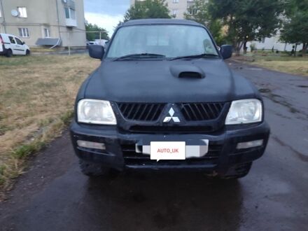 Міцубісі Л 200 2005 у Бориславе на Automoto.ua Чорний Міцубісі Л 200, об'ємом двигуна 0 л та пробігом 150 тис. км за 5500 $, фото 1 на Automoto.ua