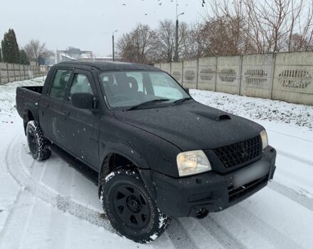Черный Мицубиси Л 200, объемом двигателя 2.5 л и пробегом 250 тыс. км за 4900 $, фото 1 на Automoto.ua