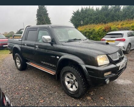 Чорний Міцубісі Л 200, об'ємом двигуна 2.5 л та пробігом 90 тис. км за 5599 $, фото 1 на Automoto.ua