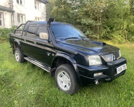 Чорний Міцубісі Л 200, об'ємом двигуна 2.5 л та пробігом 91 тис. км за 4500 $, фото 1 на Automoto.ua