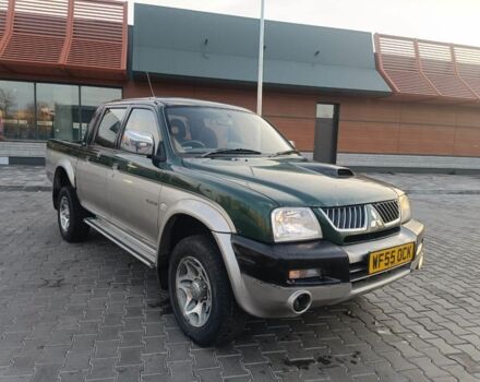 Черный Мицубиси Л 200, объемом двигателя 2.5 л и пробегом 300 тыс. км за 5100 $, фото 1 на Automoto.ua