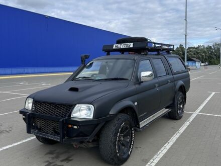 Мицубиси Л 200 2006 в Ирпене на Automoto.ua Черный Мицубиси Л 200, объемом двигателя 2.5 л и пробегом 170 тыс. км за 6100 $, фото 1 на Automoto.ua