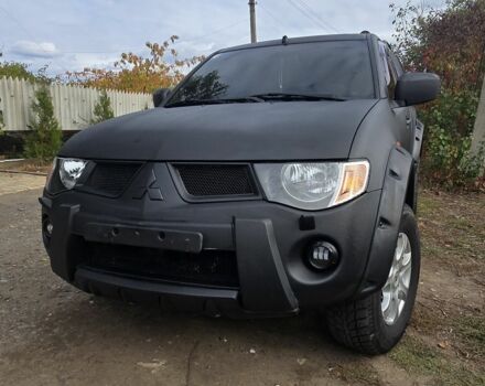 Чорний Міцубісі Л 200, об'ємом двигуна 2.5 л та пробігом 226 тис. км за 7200 $, фото 1 на Automoto.ua
