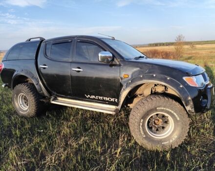 Черный Мицубиси Л 200, объемом двигателя 0 л и пробегом 160 тыс. км за 7578 $, фото 1 на Automoto.ua