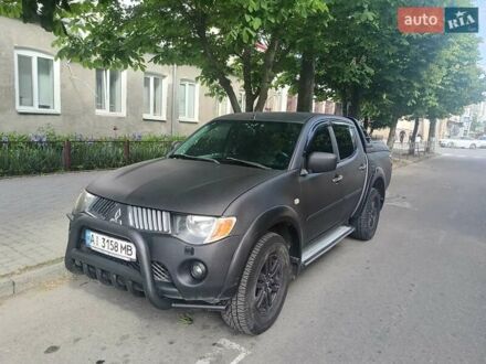 Міцубісі Л 200 2007 у Белой Церкве на Automoto.ua Чорний Міцубісі Л 200, об'ємом двигуна 2.48 л та пробігом 390 тис. км за 11999 $, фото 1 на Automoto.ua