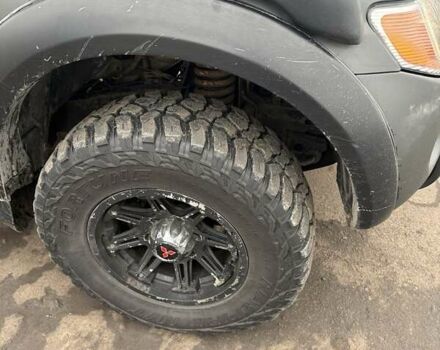 Черный Мицубиси Л 200, объемом двигателя 2.5 л и пробегом 500 тыс. км за 9300 $, фото 1 на Automoto.ua