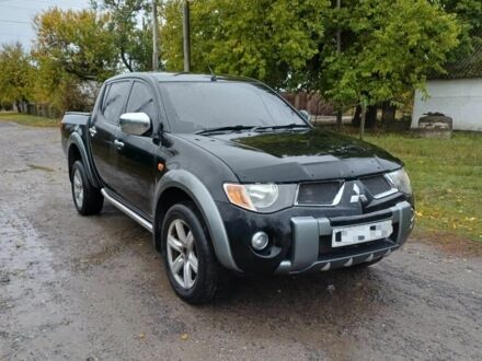 Мицубиси Л 200 2007 в Днепре (Днепропетровске) на Automoto.ua Черный Мицубиси Л 200, объемом двигателя 2.5 л и пробегом 170 тыс. км за 5900 $, фото 1 на Automoto.ua