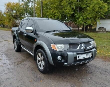 Черный Мицубиси Л 200, объемом двигателя 2.5 л и пробегом 170 тыс. км за 5900 $, фото 1 на Automoto.ua