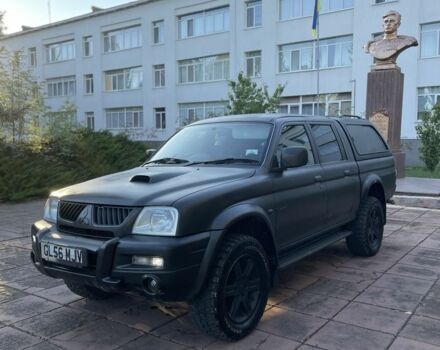 Чорний Міцубісі Л 200, об'ємом двигуна 2.5 л та пробігом 165 тис. км за 3700 $, фото 1 на Automoto.ua