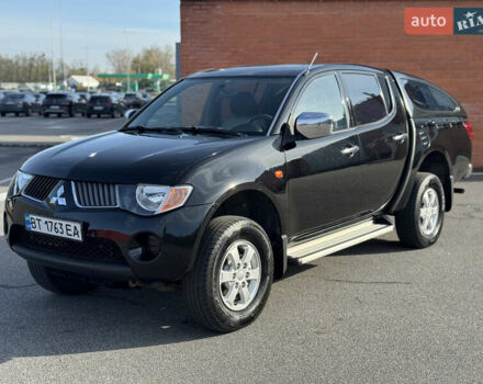 Черный Мицубиси Л 200, объемом двигателя 2.48 л и пробегом 283 тыс. км за 10999 $, фото 1 на Automoto.ua