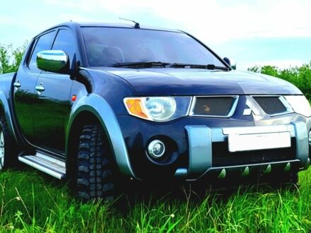 Мицубиси Л 200 2007 в Харькове на Automoto.ua Черный Мицубиси Л 200, объемом двигателя 2.5 л и пробегом 200 тыс. км за 8000 $, фото 1 на Automoto.ua
