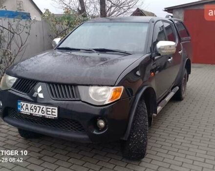 Чорний Міцубісі Л 200, об'ємом двигуна 2.48 л та пробігом 198 тис. км за 11500 $, фото 1 на Automoto.ua