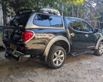 Черный Мицубиси Л 200, объемом двигателя 2.5 л и пробегом 220 тыс. км за 5832 $, фото 1 на Automoto.ua