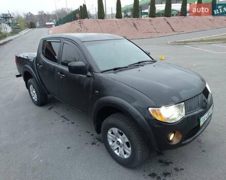 Черный Мицубиси Л 200, объемом двигателя 2.48 л и пробегом 290 тыс. км за 9900 $, фото 1 на Automoto.ua