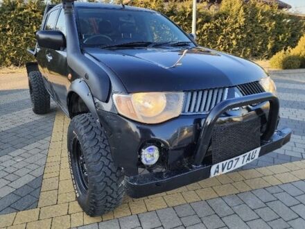 Міцубісі Л 200 2007 у Славянске на Automoto.ua Чорний Міцубісі Л 200, об'ємом двигуна 2.5 л та пробігом 250 тис. км за 6200 $, фото 1 на Automoto.ua