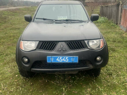 Черный Мицубиси Л 200, объемом двигателя 2.5 л и пробегом 287 тыс. км за 9000 $, фото 1 на Automoto.ua