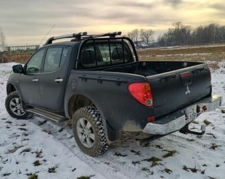 Черный Мицубиси Л 200, объемом двигателя 2.5 л и пробегом 290 тыс. км за 3500 $, фото 1 на Automoto.ua