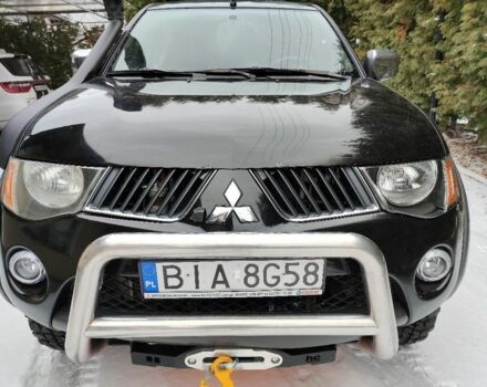 Черный Мицубиси Л 200, объемом двигателя 2.5 л и пробегом 233 тыс. км за 3100 $, фото 1 на Automoto.ua