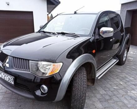 Черный Мицубиси Л 200, объемом двигателя 2.5 л и пробегом 270 тыс. км за 3424 $, фото 1 на Automoto.ua