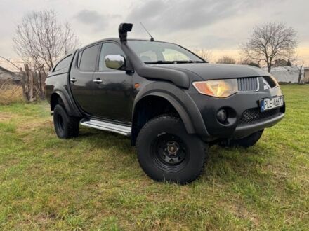 Черный Мицубиси Л 200, объемом двигателя 2.5 л и пробегом 157 тыс. км за 3400 $, фото 1 на Automoto.ua