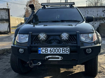 Чорний Міцубісі Л 200, об'ємом двигуна 2.48 л та пробігом 260 тис. км за 15200 $, фото 1 на Automoto.ua