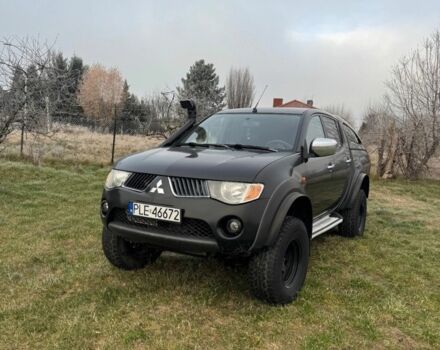 Черный Мицубиси Л 200, объемом двигателя 2.5 л и пробегом 196 тыс. км за 3000 $, фото 1 на Automoto.ua
